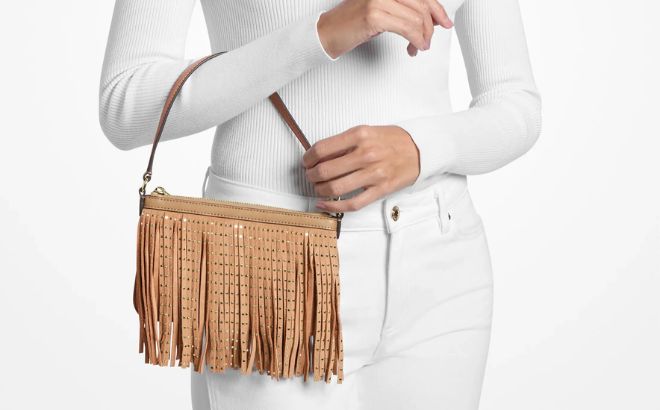 Michael KorsStudded Fringed Polyester Microsuede Wristlet Michael KorsStudded Fringed Polyester Microsuede Wristlet