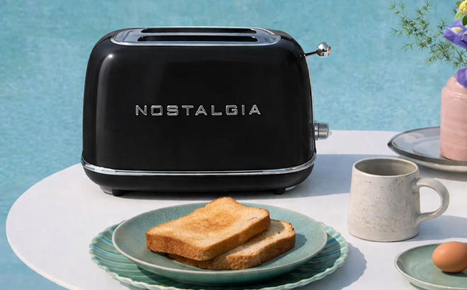 Nostalgia Classic Retro 2 Slice Toaster on the Table