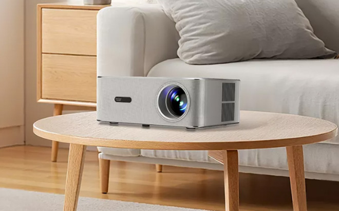 Oscal PV800 Pro Google TV Projector on the Table