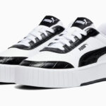 Puma Carina Mia Croc Womens Animal Print Sneakers on Gray Background