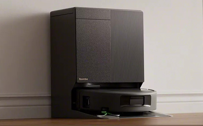 Roomba Plus 678 Combo Robot AutoWash Dock in a Living Room Roomba Plus 678 Combo Robot AutoWash Dock in a Living Room