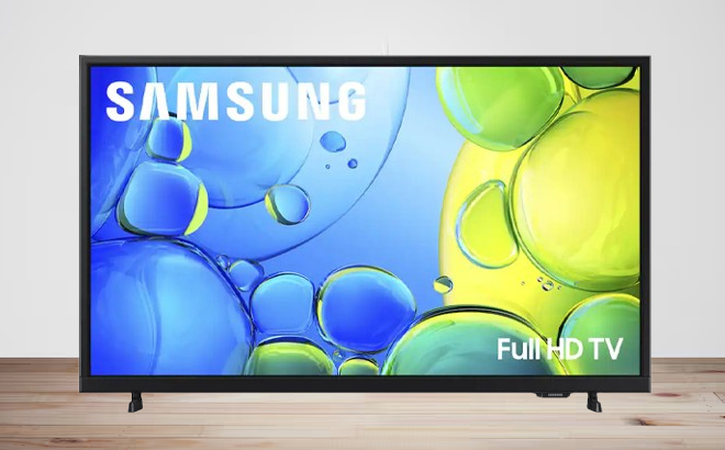 Samsung 40 Inch Class F6000F Series LED Full HD Smart Tizen TV on a Table Samsung 40 Inch Class F6000F Series LED Full HD Smart Tizen TV on a Table