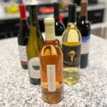 Six Bottles of Wine on a Kitchen Counter