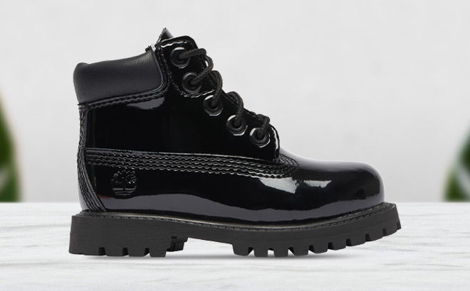 Timberland Premium Waterproof Patent Leather Toddler Boys Boot on the Table