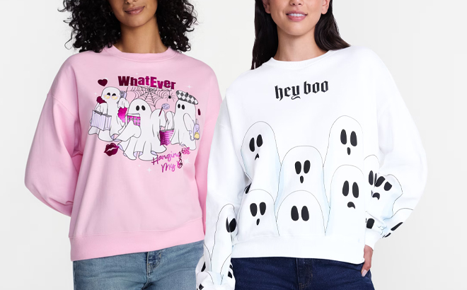 Women Wearing Sweatshirts with Halloween Designs