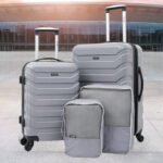 Wrangler 4 Piece Luggage Packing Set in Shark Color on the Floor