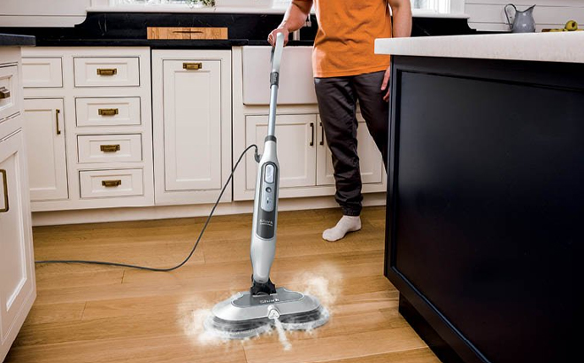 A Man Cleaning with the Shark Steam Scrub Scrubbing Steam Mop A Man Cleaning with the Shark Steam Scrub Scrubbing Steam Mop