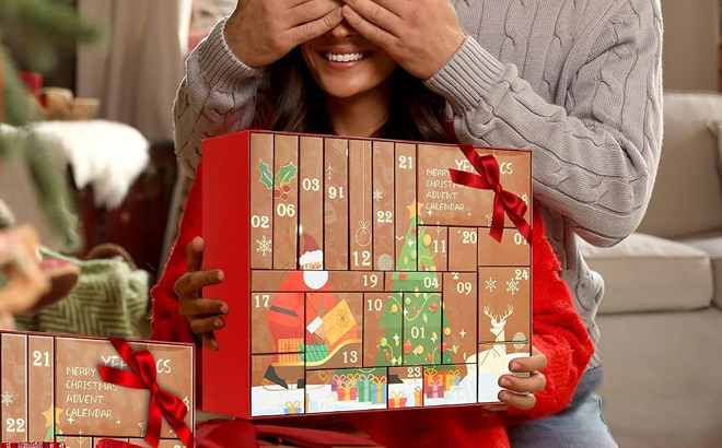 A Person Holding 24 Days Beauty Advent Calendar 2026
