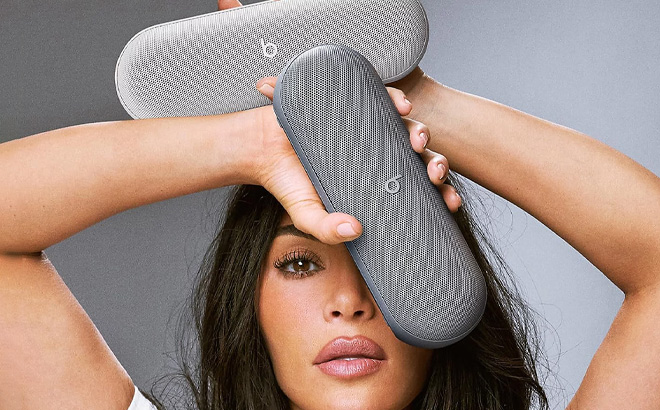 A Person Holding Beats Pill x Kim Kardashian A Person Holding Beats Pill x Kim Kardashian