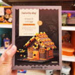 A Person Holding Favorite Day Halloween Mini Moonlit Cottage Cookie House Kit