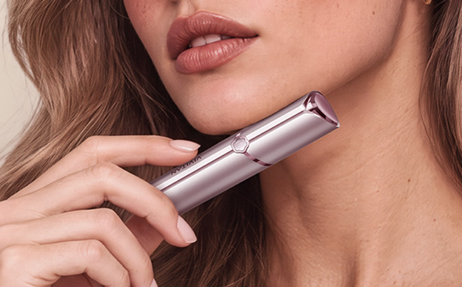 A Person Holding Flawless Facial Hair Removal