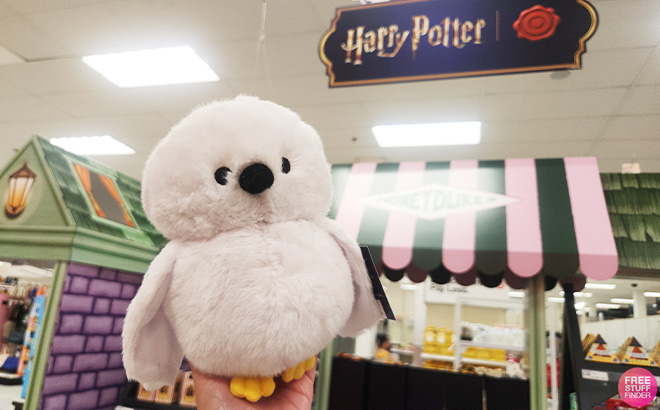 A Person Holding Harry Potter Creature Medium Plush Hedwig A Person Holding Harry Potter Creature Medium Plush Hedwig
