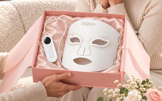 A Person Holding Red Light Therapy Mask 1