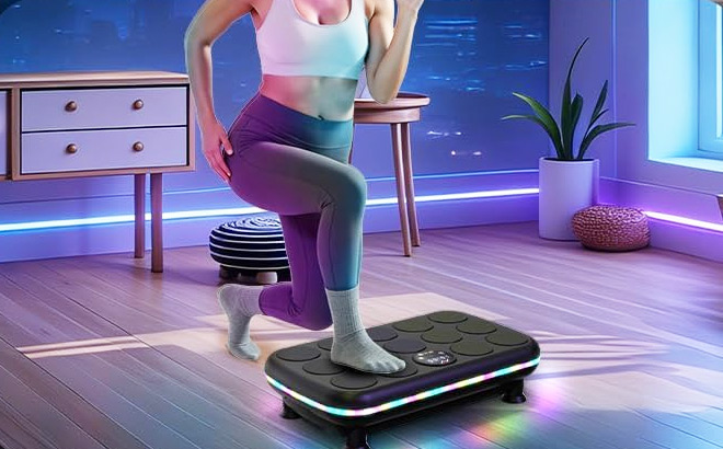 A Person Using AXV Vibration Plate Exercise Machinet A Person Using AXV Vibration Plate Exercise Machinet