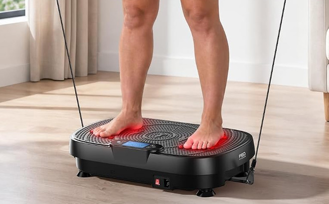 A Person Using Vibration Plate with Red Light A Person Using Vibration Plate with Red Light