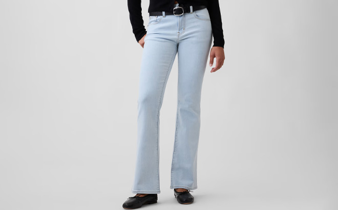 A Person Wearing GAP Factory Womens Mid Rise Boot Jeans A Person Wearing GAP Factory Womens Mid Rise Boot Jeans