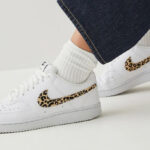 A Person Wearing Nike Court Vision Low SE Womens Shoes