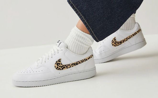 A Person Wearing Nike Court Vision Low SE Womens Shoes