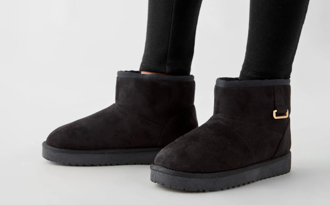 A Person Wearing The Childrens Place Girls Teddy Boots