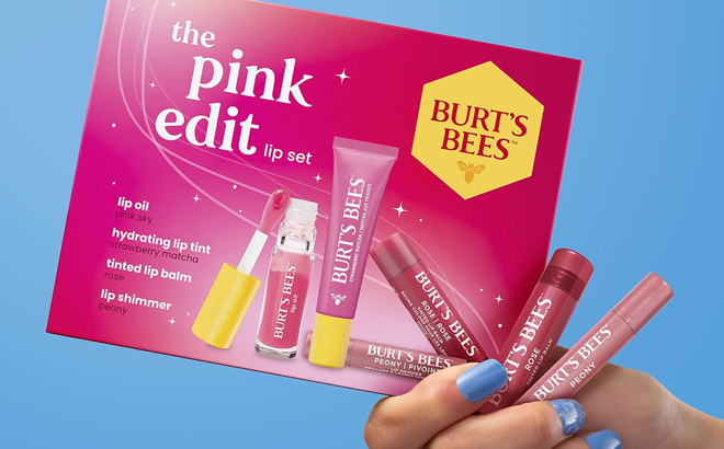 A Woman Holding Burts Bees The Pink Edit Holiday Lip Care Gift Set