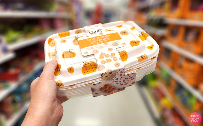 A Woman Holding Cook With Color 6 Piece Halloween Pumpkin Rectangular Food Storage Container Set A Woman Holding Cook With Color 6 Piece Halloween Pumpkin Rectangular Food Storage Container Set