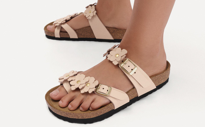 A Woman Wearing Birkenstock Mayari Flowers Leather Sandals