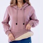 A Woman Wearing Haellun Fleece Sherpa Lined Pullover Hooded Sweatshirt