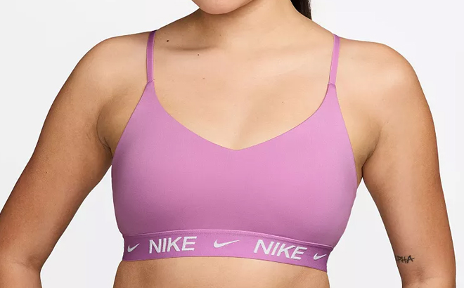 A Woman Wearing Nike Indy Light Support Padded Sports Bra