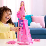 Barbie Rise Surprise Doll Accessories on Table