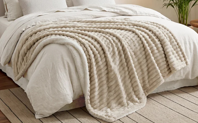 Bedsure Reversible Sherpa Fleece Blanket on a Bed Bedsure Reversible Sherpa Fleece Blanket on a Bed