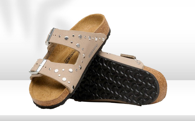 Birkenstock Arizona Rivets Studded Kids Slide Sandals on the Table