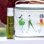 ELEMIS Pro Collagen Green Fig Cleansing Balm Multi Mist with Bag on a Product Stand