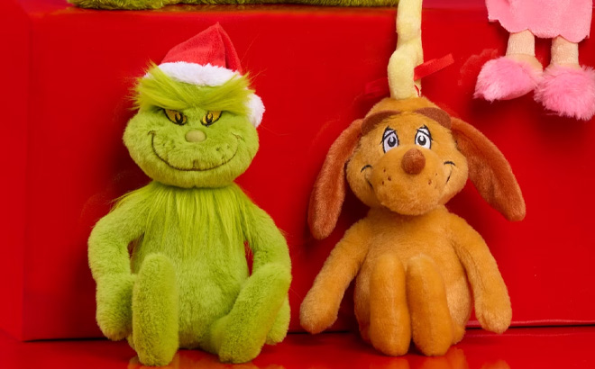 Grinch Plushies on the Red Table