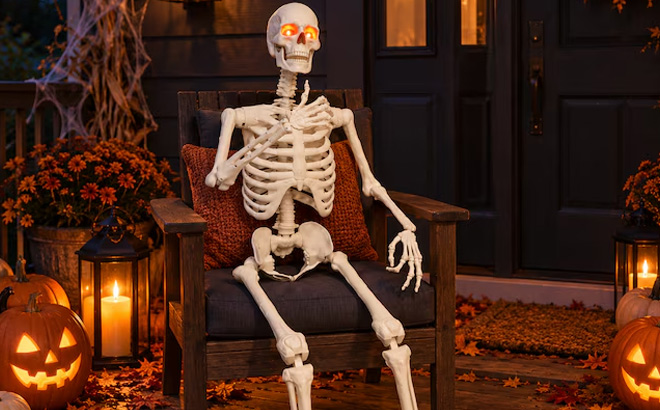 Haunted Living 5 ft Ultra Posable Skeleton Halloween Decoration on the Chair Haunted Living 5 ft Ultra Posable Skeleton Halloween Decoration on the Chair
