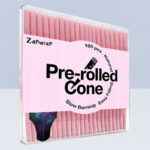 Pink Cones Rolling Paper 100 Pack on the Table