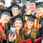 College Students Laughing and Taking a Selfie