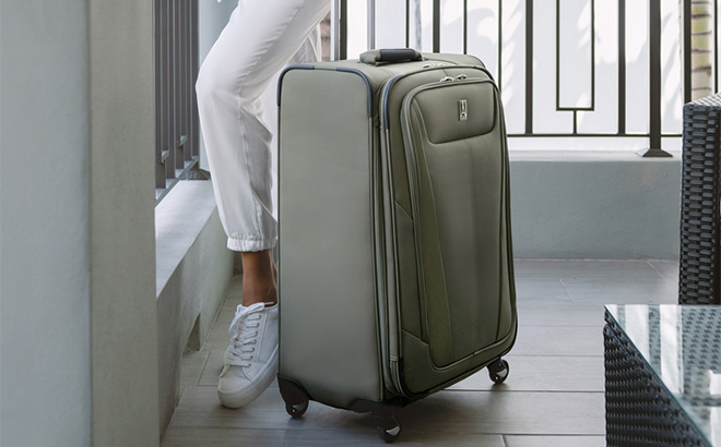 A Person Using Travelpro Wheeled Luggage