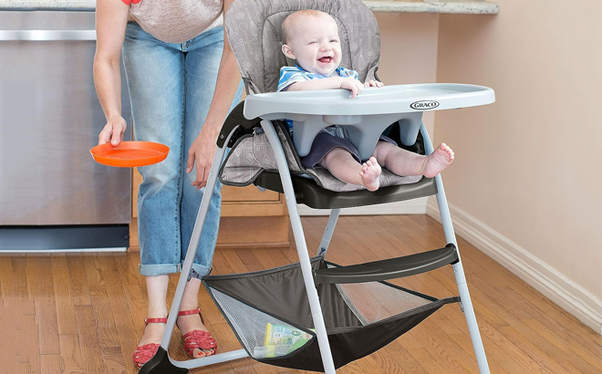 Baby Sitting in a Graco Slim Snacker High Chair