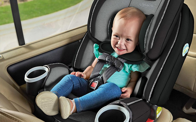 Bay Sitting in a Graco 4Ever DLX 4 in 1 Car Seat