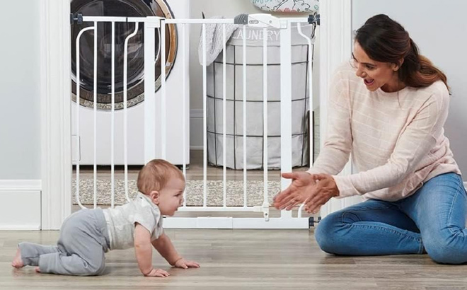 Mother and Baby Playing In Front of a Regalo Easy Step 38 5 Inch Wide Walk Thru Baby Gate